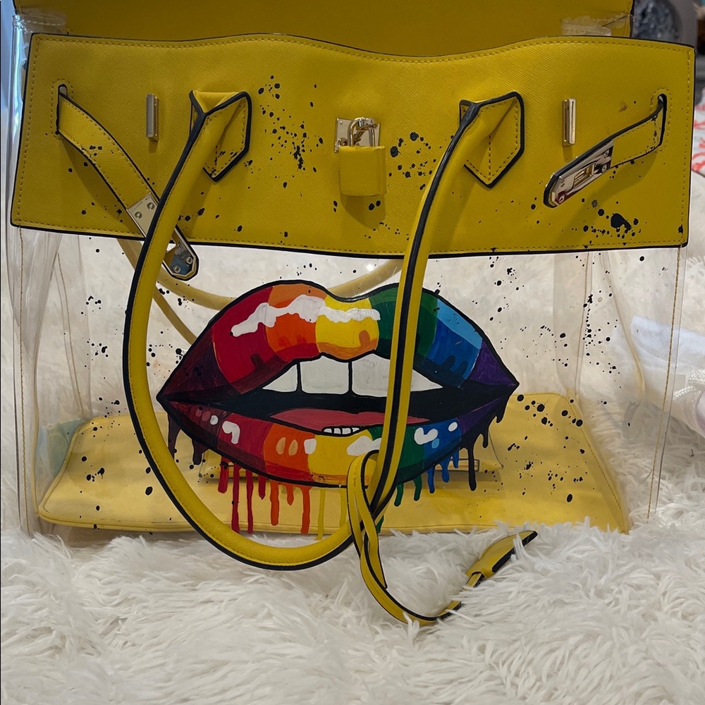De Vesi hand painted tote.  Bright yellow trim with black splatter design.